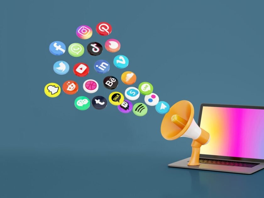 Social media marketing. Digital marketing 3d icons, Megaphone, and laptop with a  Greyish Blue Color background